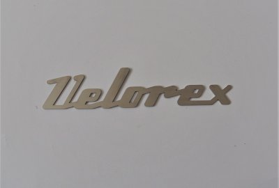 Emblemat VELOREX, nierdzewny