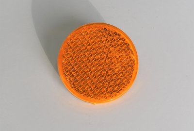 Odblask pomarańczowy, ze śrubką, 60 mm, plastik, Jawa, CZ