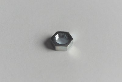 Nakrętka śruby regulacyjnej gaźnika, M6x0,75mm, ocynk, Jawa, CZ
